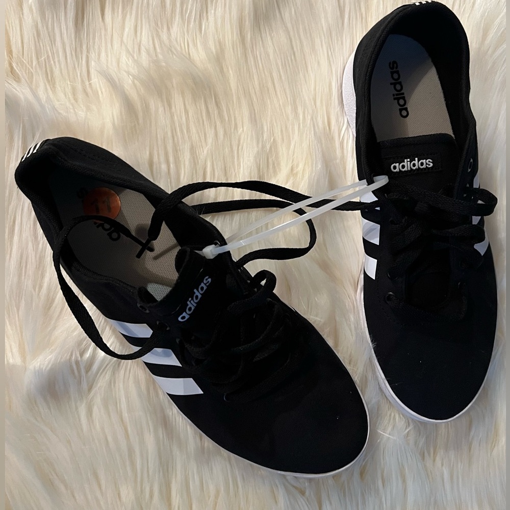 Brand new size 11 adidas shoes